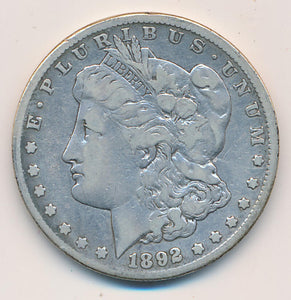 1892 CC Morgan Silver Dollar. RAW Image 1